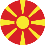 Flag of North Macedonia featuring a sun emblem and rays in red and yellow colors.